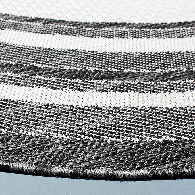 SAFAVIEH Washable Rug Outdoor Courtyard Collection - 6'7" Round, Ivory & Black, Non-Shedding & Easy Cleaning, Ideal for Patio, Backyard, Mudroom (CY8475-53712)