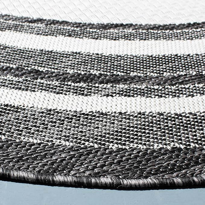 SAFAVIEH Washable Rug Outdoor Courtyard Collection - 7'10" Round, Ivory & Black, Non-Shedding & Easy Cleaning, Ideal for Patio, Backyard, Mudroom (CY8475-53712)