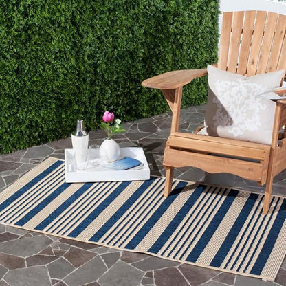SAFAVIEH Washable Rug Outdoor Courtyard Collection - 2'7" x 5', Navy & Beige, Non-Shedding & Easy Cleaning, Ideal for Patio, Backyard, Mudroom (CY6062-268)
