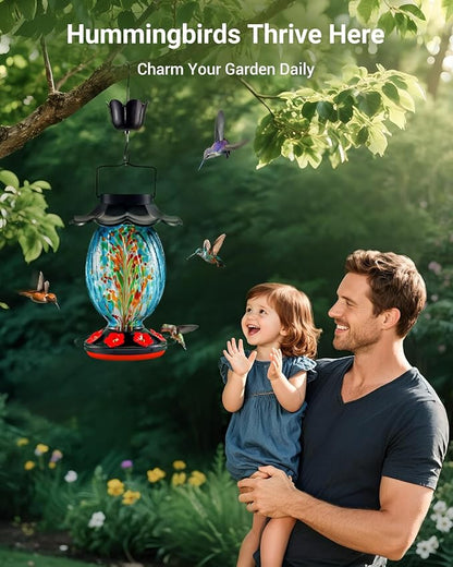 Solar Hummingbird Feeder - 49 fl.oz Hand Blown Glass Color Changing - 7 Feeding Ports with Perch - Never Leak - Perfect Hummingbird Feeder for Outdoors Hanging (Blue)