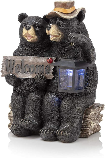 Alpine Corporation 15" H Outdoor Bear Couple with Lantern and Welcome Sign Statue with Solar LED Lights, Black