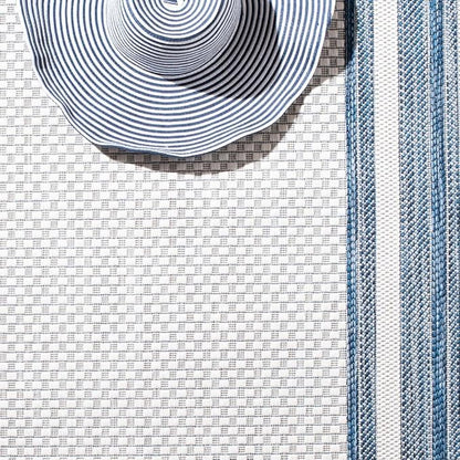 SAFAVIEH Washable Rug Outdoor Courtyard Collection - 7'10" Round, Ivory & Navy, Non-Shedding & Easy Cleaning, Ideal for Patio, Backyard, Mudroom (CY8475-53412)
