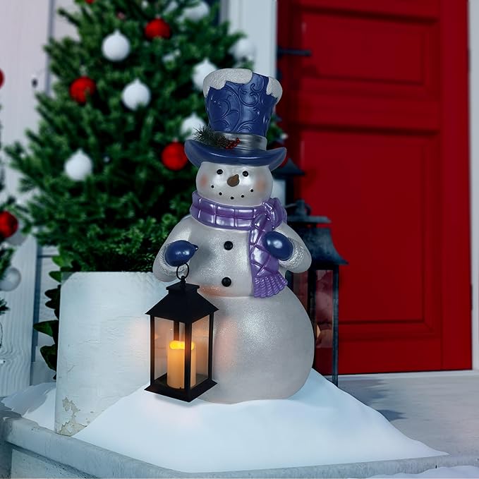 Alpine Corporation SKY562L-TM Lavender Winter Snowman Holding Lantern Statue with Warm White Flashing LED Candle, 3 Feet Tall, Indoor/Outdoor Holiday Decoration
