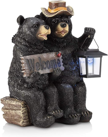 Alpine Corporation 15" H Outdoor Bear Couple with Lantern and Welcome Sign Statue with Solar LED Lights, Black