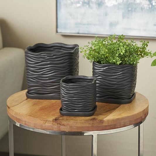 Deco 79 Ceramic Indoor Outdoor Planter Wavy Ribbed Large Planter Pot with Attached Saucer, Set of 3 Planters 7",6",5" H, Black