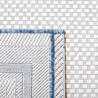 SAFAVIEH Washable Rug Outdoor Courtyard Collection - 7'10" Round, Ivory & Navy, Non-Shedding & Easy Cleaning, Ideal for Patio, Backyard, Mudroom (CY8475-53412)