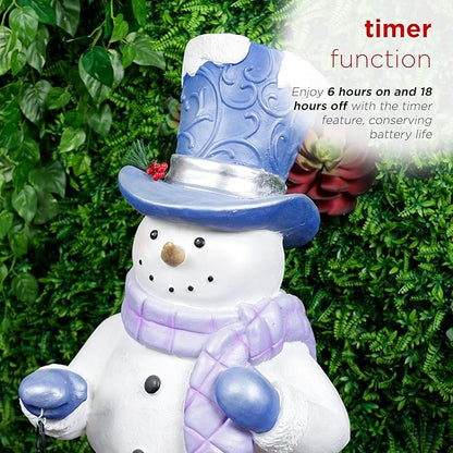 Alpine Corporation SKY562L-TM Lavender Winter Snowman Holding Lantern Statue with Warm White Flashing LED Candle, 3 Feet Tall, Indoor/Outdoor Holiday Decoration