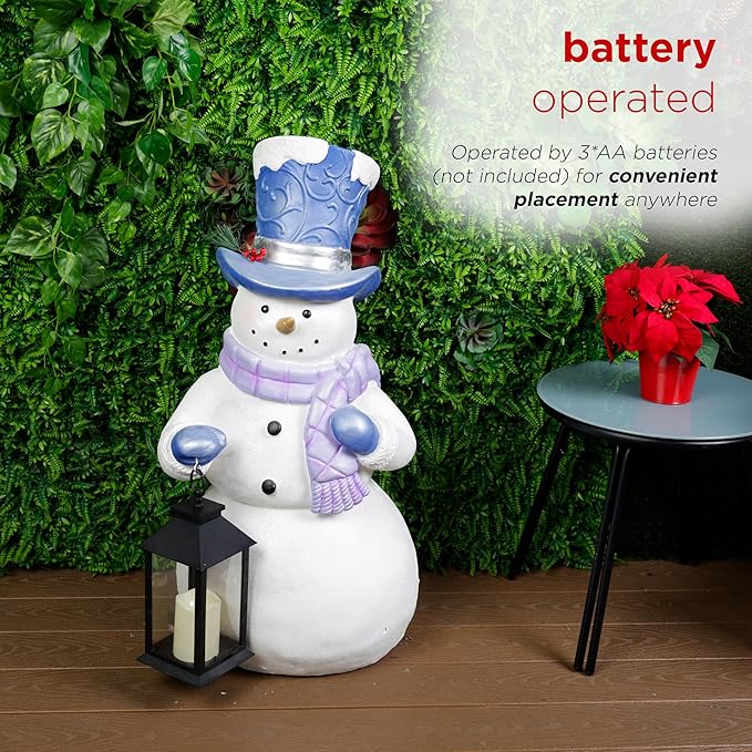 Alpine Corporation SKY562L-TM Lavender Winter Snowman Holding Lantern Statue with Warm White Flashing LED Candle, 3 Feet Tall, Indoor/Outdoor Holiday Decoration