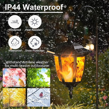 Dynaming 4 Pack Solar Flame Hanging Lights Outdoor, Halloween Solar Flickering Flame LED Garden Lanterns with 4 x 38 Inch Shepherd Hooks, Christmas Lighting for Lawn Patio Yard Pathway Driveway