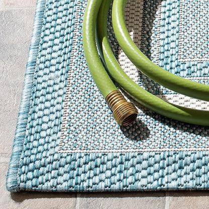 SAFAVIEH Washable Rug Outdoor Courtyard Collection - 6'7" x 9'6", Ivory & Aqua Blue, Non-Shedding & Easy Cleaning, Ideal for Patio, Backyard, Mudroom (CY8475-53612)