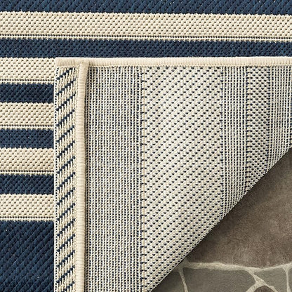 SAFAVIEH Washable Rug Outdoor Courtyard Collection - 2'7" x 5', Navy & Beige, Non-Shedding & Easy Cleaning, Ideal for Patio, Backyard, Mudroom (CY6062-268)
