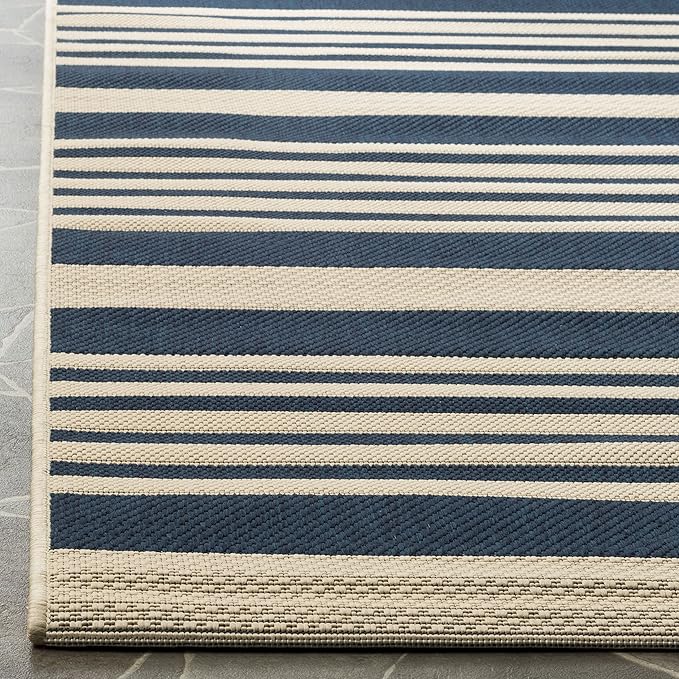 SAFAVIEH Washable Rug Outdoor Courtyard Collection - 2'7" x 5', Navy & Beige, Non-Shedding & Easy Cleaning, Ideal for Patio, Backyard, Mudroom (CY6062-268)