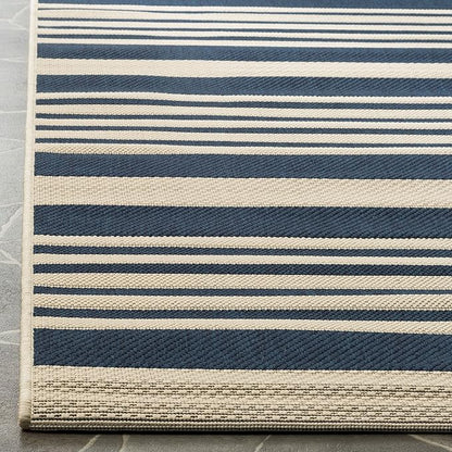 SAFAVIEH Washable Rug Outdoor Courtyard Collection - 2'7" x 5', Navy & Beige, Non-Shedding & Easy Cleaning, Ideal for Patio, Backyard, Mudroom (CY6062-268)